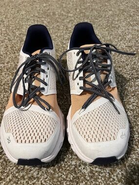 On Running Women’s Peach and White Athletic Trainers with Navy Laces